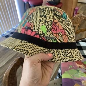 Roxy, Y2K vibes, sun hat, neon accent detail